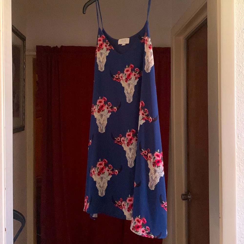 Peach Love brand, size medium with pockets, in the color Dark Navy Blue.